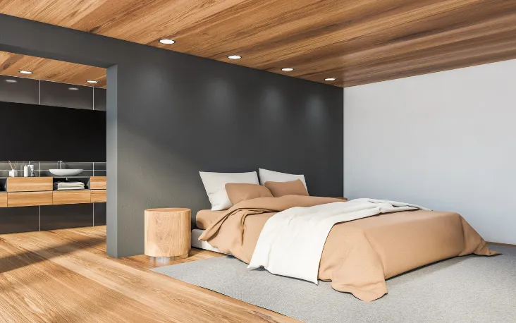 Luxury primary suite addition featuring a modern bedroom layout and ensuite design in Dallas TX