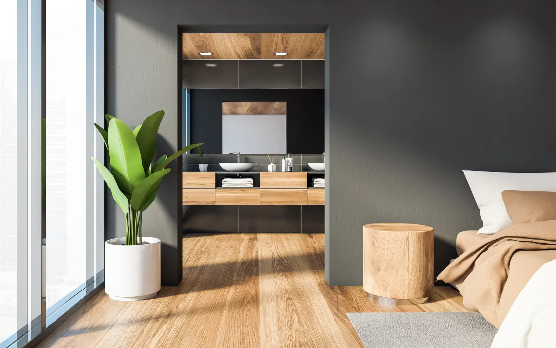 Primary suite addition showing seamless transition from bedroom to bathroom with modern finishes in Dallas TX