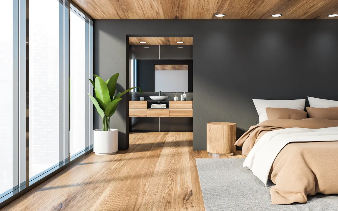 Finished primary suite addition with modern bedroom design and ensuite bathroom in a Dallas home